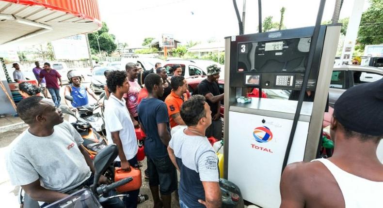 Queues formed at petrol stations in the French overseas territory of Guiana as people tried to stock up on fuel ahead of a general strike on Monday