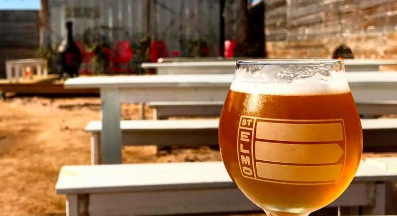 Sample craft beers in St. Elmo Brewing Company's spacious backyard.