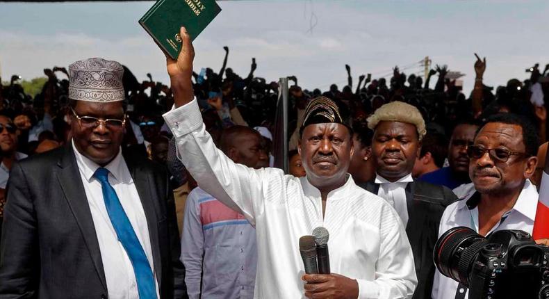 Miguna Miguna, Raila Odinga, TJ Kajwang and james Orengo at the mock swearing in ceremony at Uhuru Park