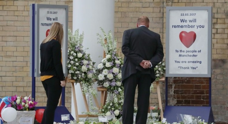 Floral tributes at the Manchester Victoria railway station on Tuesday as services resumed a week after the suicide bombing at a pop concert that killed 22 people