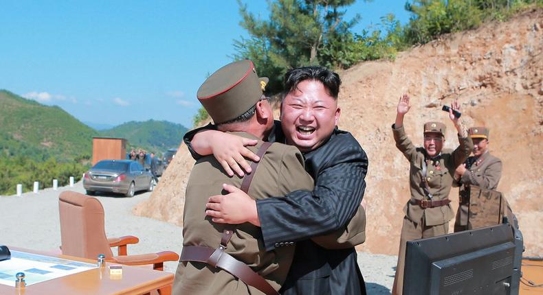North Korean leader Kim Jong Un with scientists and technicians after the testing of the intercontinental ballistic missile Hwasong-14 in a photo released by North Korea's Korean Central News Agency on Wednesday.