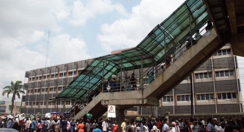 Pedestrians queuing to cross Ojota pedestrian bridge