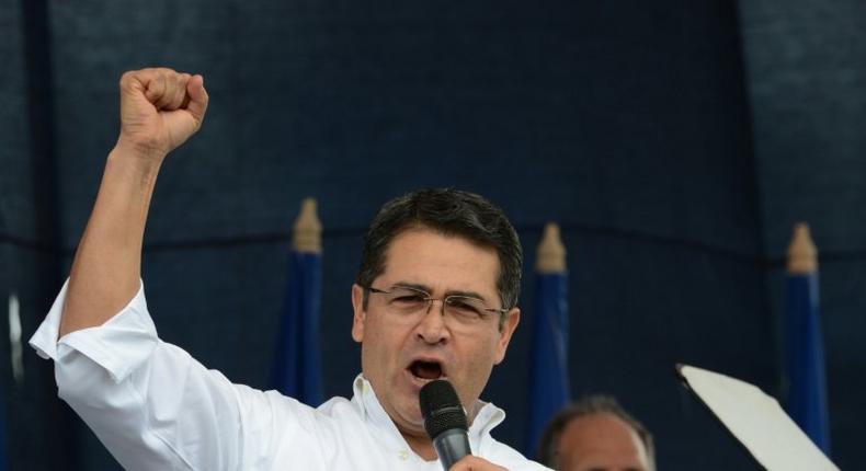 President Juan Orlando Hernandez said he would run on his record of fighting the violent crime that made Honduras one of the most murderous countries in the world
