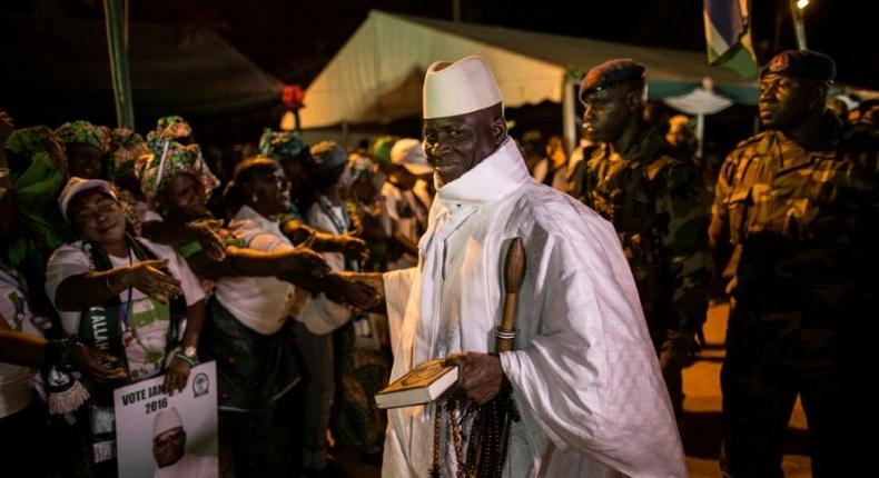 Yahya Jammeh (C), pictured in 2016, ran everything from bakeries to farms during his tenure as Gambia's president and was regularly accused of taking over successful businesses for his own gain