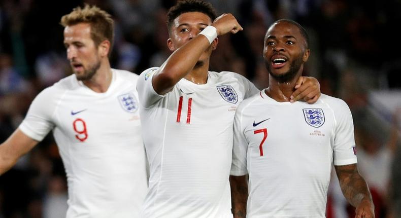 Talented trio: Harry Kane (left), Jadon Sancho (centre) and Raheem Sterling (right) have scored 14 goals in four Euro 2020 qualifiers