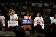 Women representing Stolen Lives families take part in a Trump rally in Anaheim