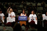 Women representing Stolen Lives families take part in a Trump rally in Anaheim