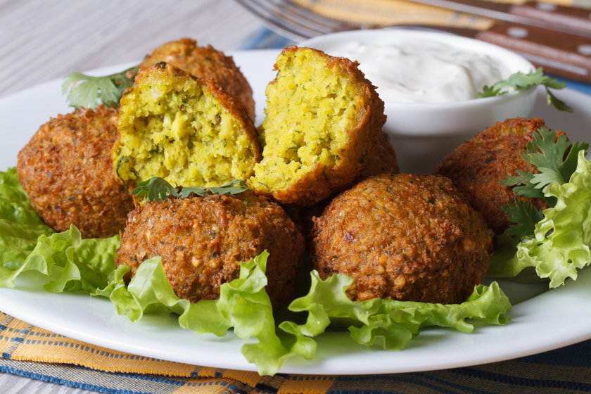 Falafel on the lettuce with tzatziki sauce, horizontal