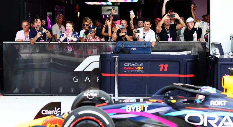 Fans watch as Max Verstappen drives past at the Miami Grand Prix.Dan Istitene - Formula 1/Formula 1 via Getty Images