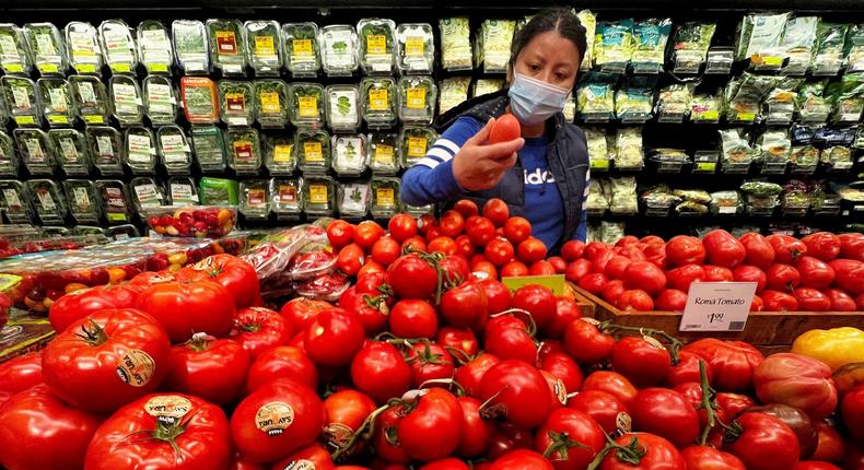 A person shops at a Whole Foods grocery store in the Manhattan borough of New York City, New York, U.S., March 10, 2022.