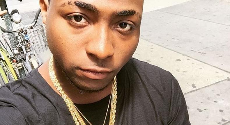 Davido rocking his HKN neck piece few hours before Sira Kante shared her picture