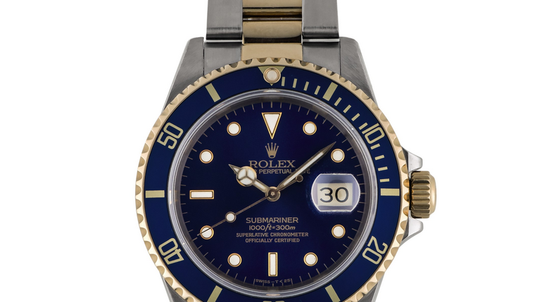 15. Rolex: Submariner, Ref 16613 — Stainless steel and yellow gold wristwatch with date and bracelet circa 1991