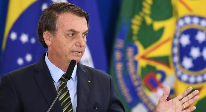 Brazilian President Jair Bolsonaro, pictured giving a speech in Brasilia on December 9, 2019, says God is Brazilian