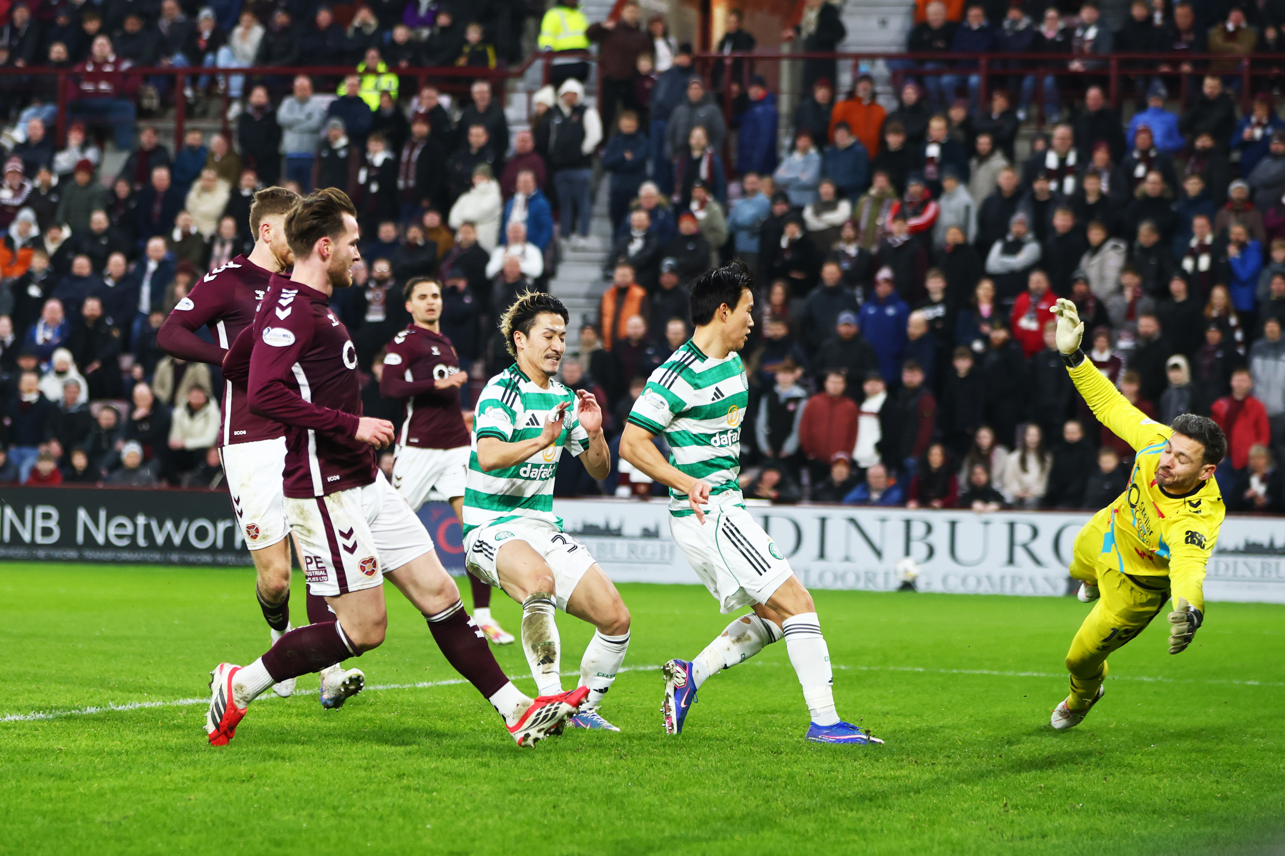 Hearts defy Celtic twice to protect top spot despite missing key players