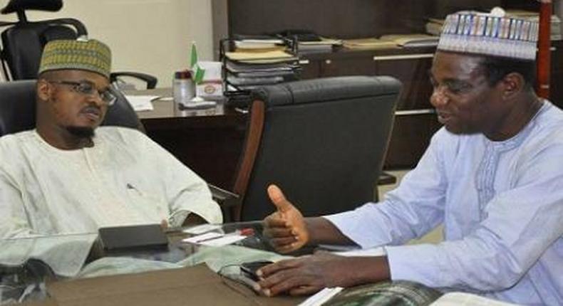 Dr Isa Ali Ibrahim (Pantami), director general, National Information Technology Development Agency (NITDA), listening to attentively to a point being stressed by Professor Raufu Adebisi, director general, Nigeria French Language Village, who led a delegation of the Village on a courtesy visit to NITDA recently.