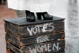 Councillor Elaine Pantling, dressed as suffragette Alice Hawkins, speaks during an event to mark 100 years of votes for women in Leicester