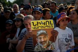 Armenian opposition supporters attend a rally after protest movement leader Nikol Pashinyan announce