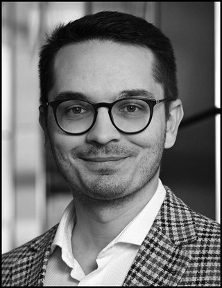 Michał Wysłocki, menedżer w zespole Immigration EY Polska