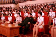 FILE PHOTO: North Korean leader Kim Jong Un and wife Ri Sol Ju enjoy an art performance given by the Chongbong Band to mark the 70th anniversary of the founding of the Workers' Party of Korea (WPK) in this undated KCNA photo