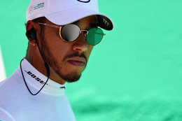 Lewis Hamilton’s team was robbed at gunpoint but he still fought his way to fourth in a go-kart style race