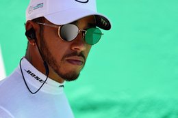 Lewis Hamilton’s team was robbed at gunpoint but he still fought his way to fourth in a go-kart style race