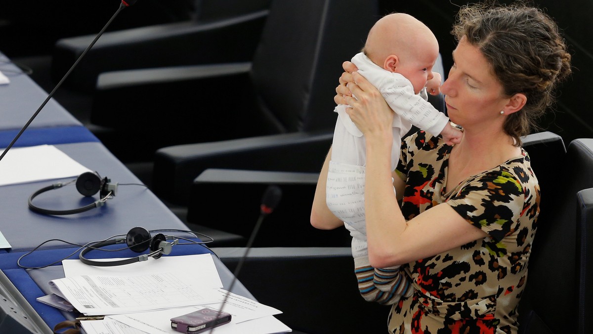 European Parliament member Anneliese Dodds of the UK holds her baby as she takes part in a voting session at the European Parliament in Strasbourg