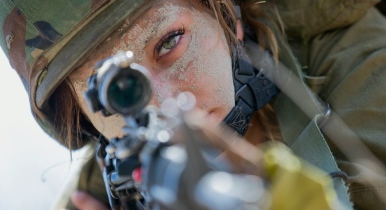 An Israeli female soldier from the Bardalas battalion takes part in training at a military camp near the northern Israeli city of Yoqne'am Illit