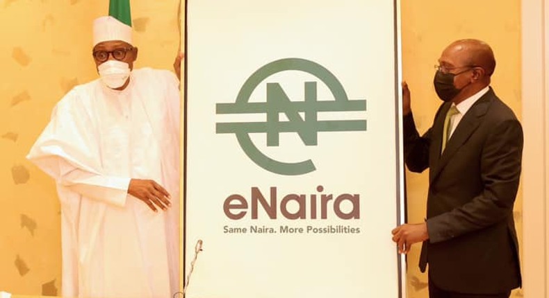 L-R: President Muhammadu Buhari; and CBN Governor, Godwin Emefiele at the launch of e-Naira [Presidency]