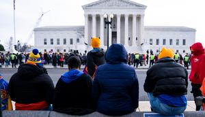 FEBRUARY 28: People gather during a protest in support of student debt cancellation as the Supreme Court begins oral arguments outside of the Supreme Court of the United States in Washington, D.C., on Tuesday February 28, 2023.Sarah Silbiger for The Washington Post via Getty Images
