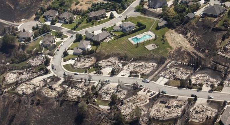 Residents return to see homes destroyed by Washington state fire