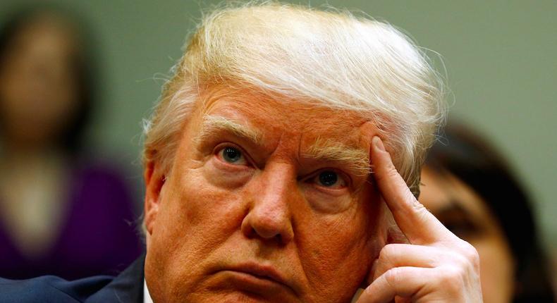 U.S. President Donald Trump looks up during a meeting about healthcare at the White House in Washington, U.S., March 13, 2017.