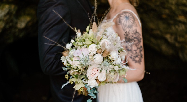 Tattoo artists have noticed a trend of Gen Z and millennial brides regretting their tattoos.Anna Mardo/Getty Images