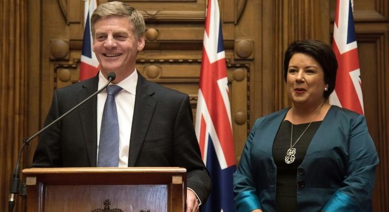 New Zealand's new Prime Minister Bill English (L) speaks to the media beside his deputy Paula Bennett during a press conference at Parliament in Wellington on December 12, 2016