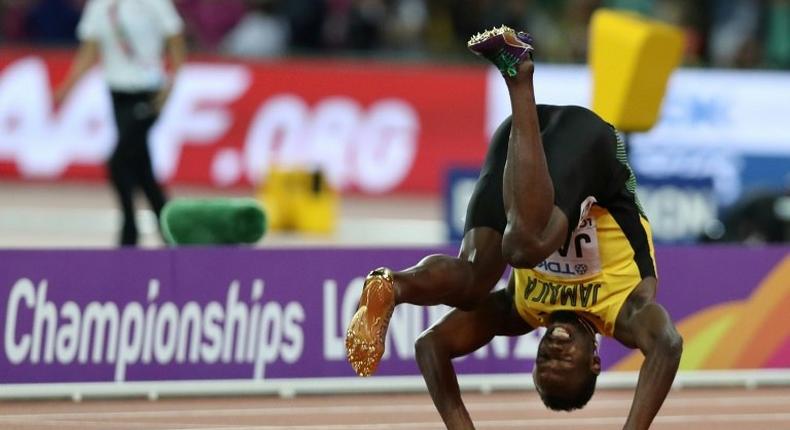 Jamaica's Usain Bolt falls after injuring himself in the final of the men's 4x100m relay at the 2017 IAAF World Championships at the London Stadium in London on August 12, 2017