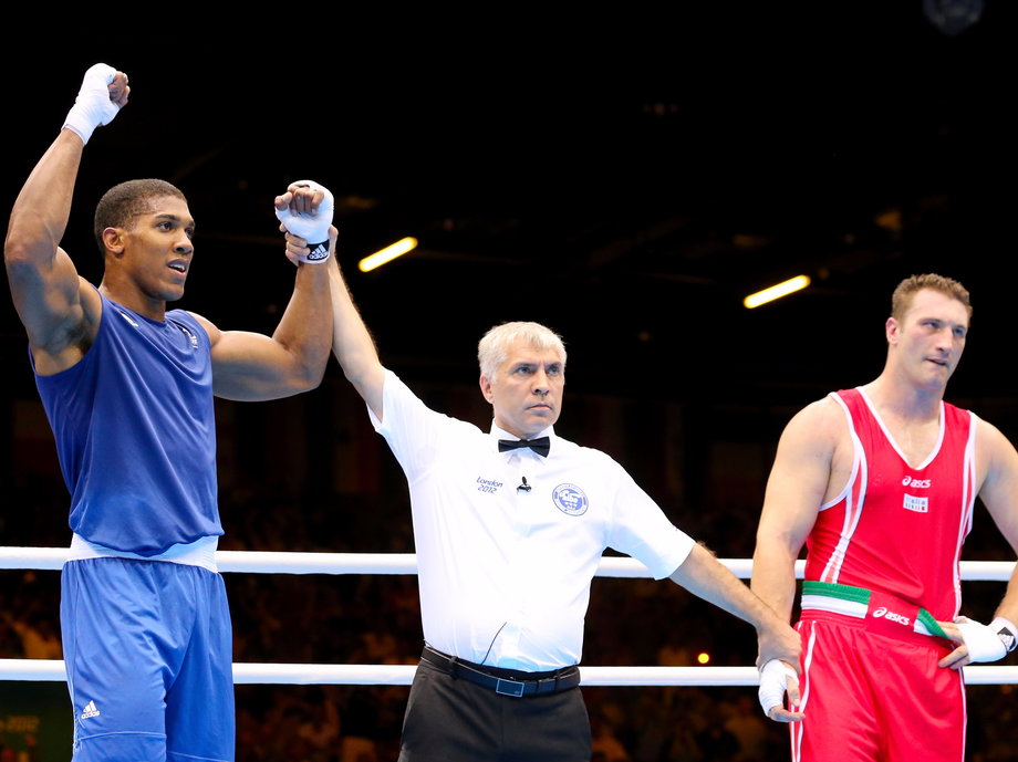 Anthony Joshua celebrates winning the gold medal at the 2012 Olympic Games — his last fight as an amateur.