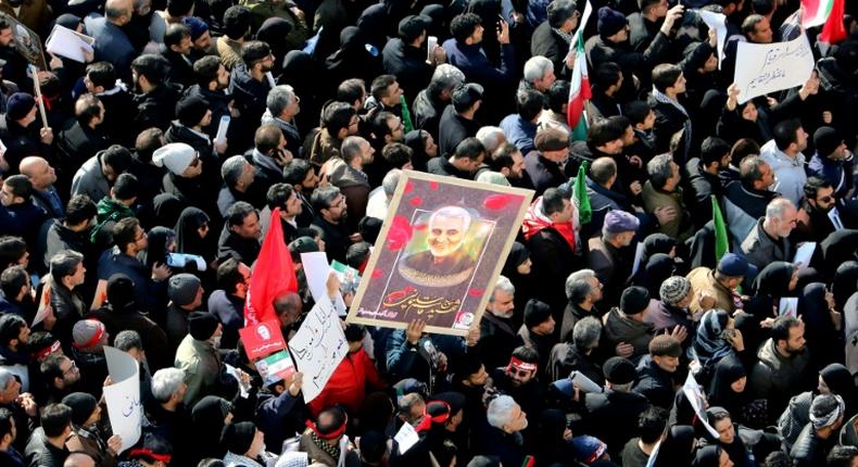 People packed the streets in cities across Iran for ceremonies commemorating the mastermind of Iran's operations in Iraq, Syria and Yemen