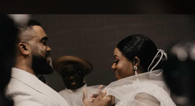 Yomola unveils his bride, Yomola, at their nuptials in Minneapolis, Minnesota, USA in September 2018.