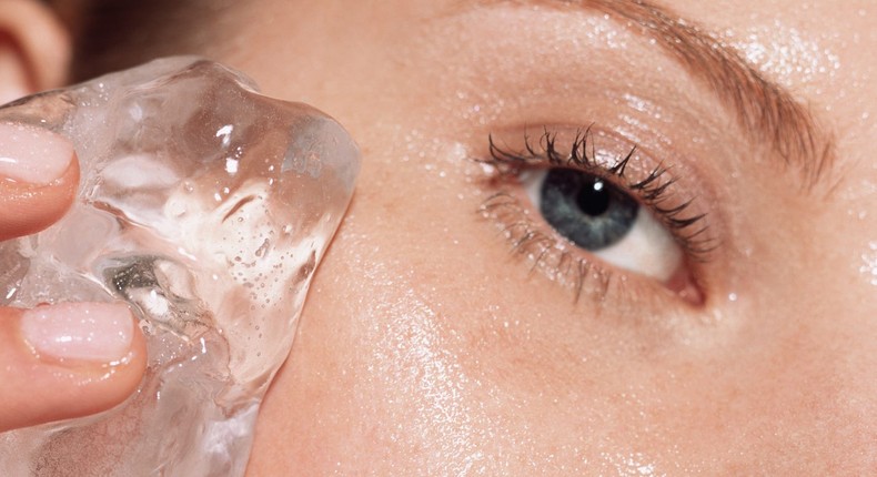 You should move the ice across your face in a gentle, circular motion.Image Source/Getty Images