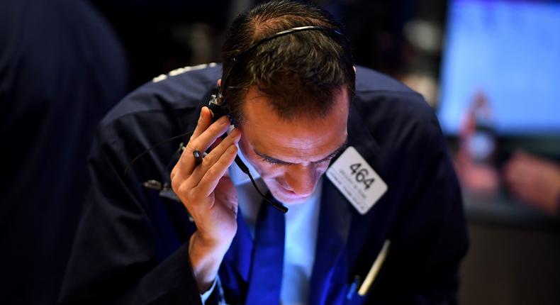 A trader works during the opening bell at the New York Stock Exchange.(Photo by Johannes EISELE / AFP) (Photo by JOHANNES EISELE/AFP via Getty Images)