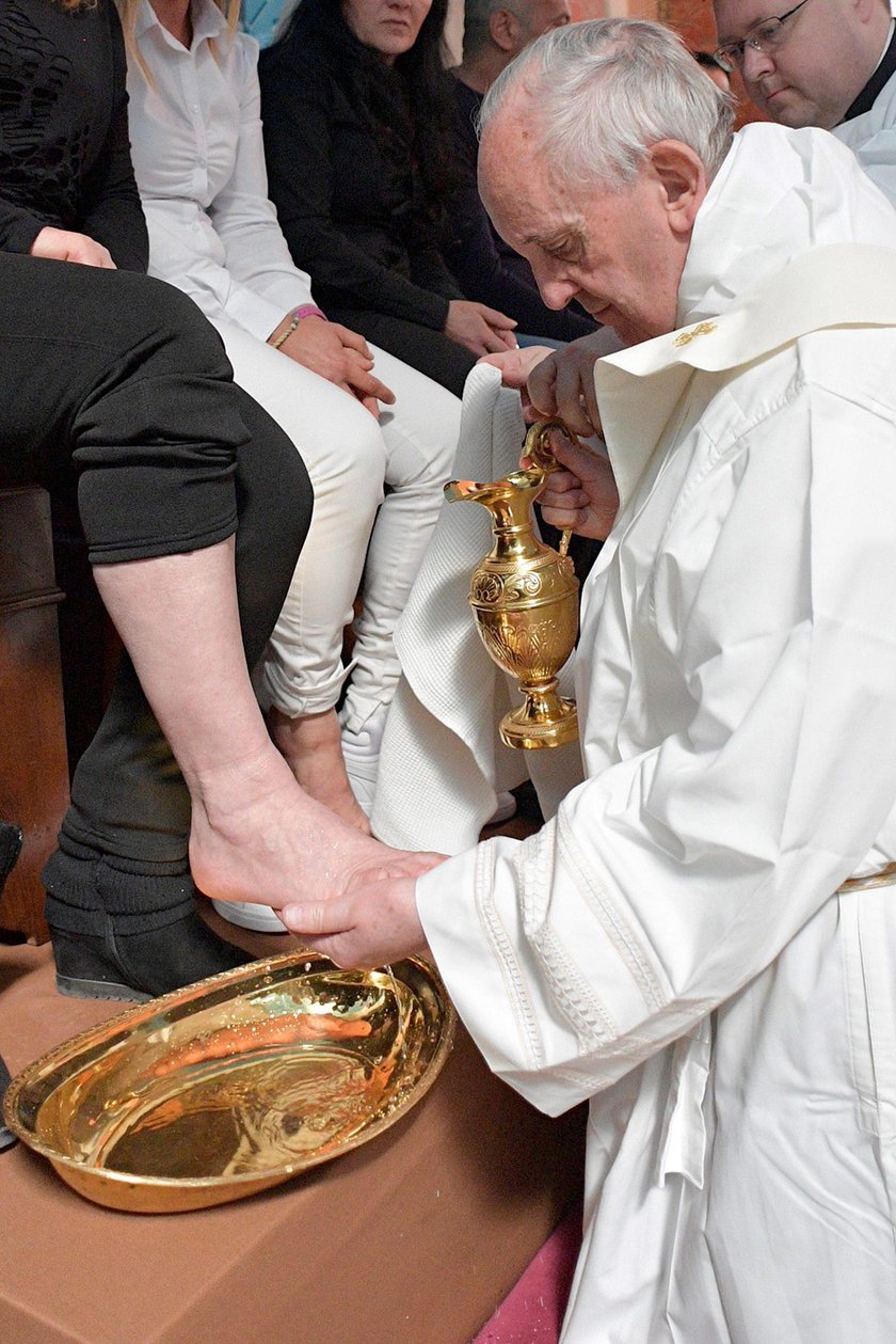 Pope Francis washes the feet of some inmates at the Paliano prison, south of Rome