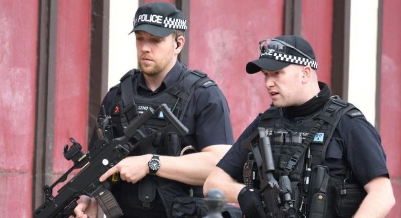 Armed police on patrol near Manchester Arena following a deadly terror attack at an Ariana Grande concert