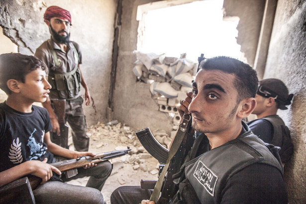 Bojownicy Syryjskiej Wolnej Armii w czasie walk w Aleppo, fot. Dona Bozzi