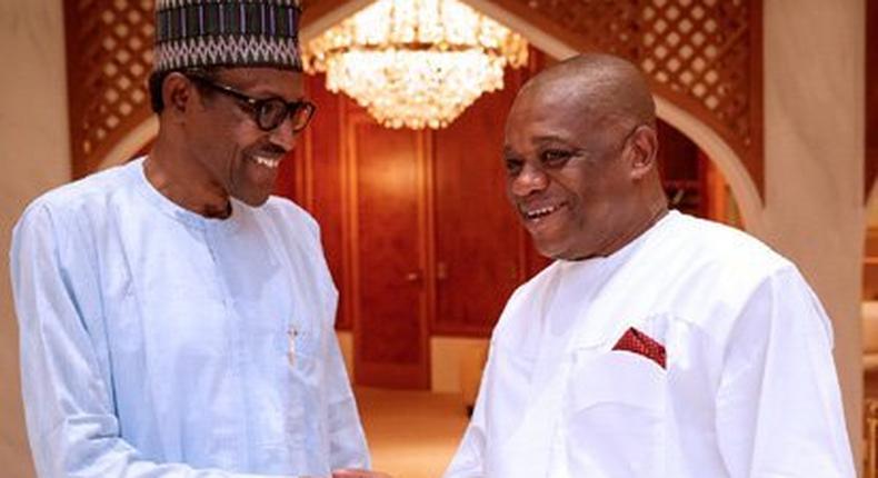 Orji Uzor Kalu (right) wants to succeed President Muhammadu Buhari (left) [Presidency]