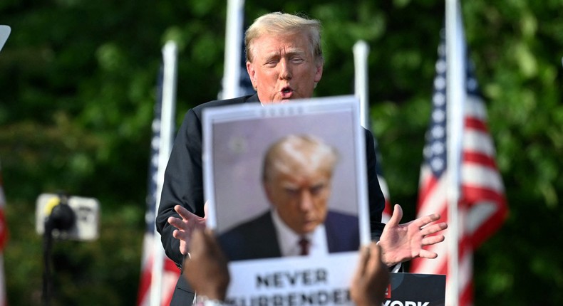 Former President Donald Trump and his campaign have tried to turn his legal woes, especially his mugshot, into a badge of honor.Jim Watson/AFP/Getty Images