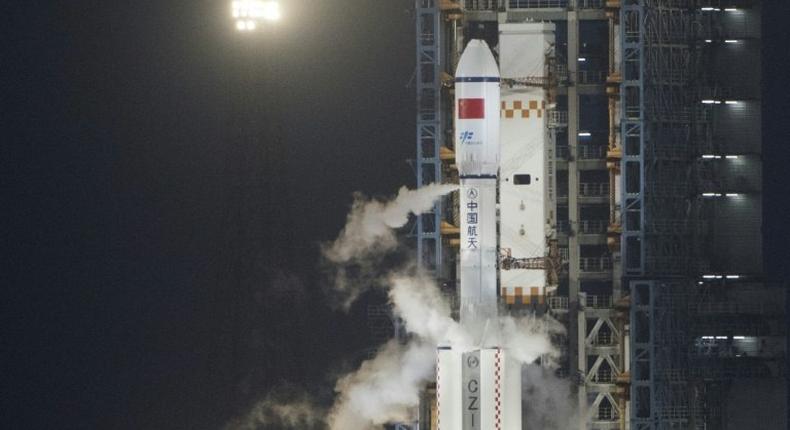 A Long March 7 orbital launch vehicle carrying China's cargo spacecraft Tianzhou-1 shortly before lift off at the Wenchang Space Launch Centre on April 20, 2017
