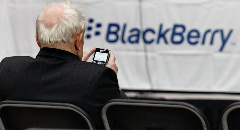 A shareholder uses his Blackberry while waiting for the Research In Motion annual meeting to begin in Waterloo, July 17, 2007.