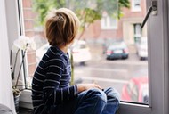 7 year old boy playing tablet