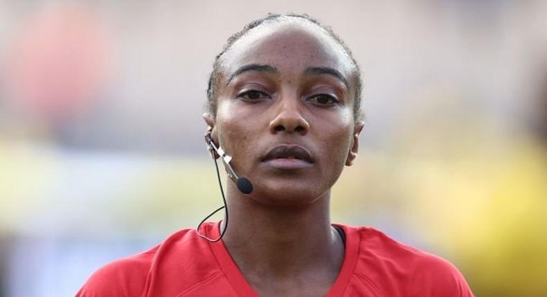 Rwandan referee Salima Mukansanga poses prior to the Group B Africa Cup of Nations (CAN) 2021 football match between Zimbabwe and Guinea at Stade Ahmadou Ahidjo in Yaounde on January 18, 2022. (Photo by KENZO TRIBOUILLARD/AFP via Getty Images)