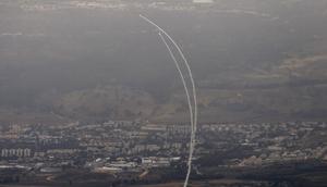 Israel's Iron Dome missile defense system launching to intercept rockets being fired from Lebanon next to the city of Kiryat Shmonaon on May 10, 2024.JALAA MAREY/AFP via Getty Images