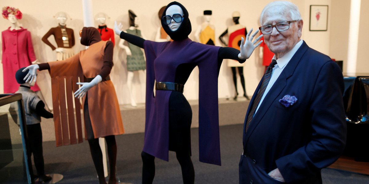 FILE PHOTO: French fashion designer Pierre Cardin poses in front of his fashion creations in his mus